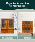 Front view of Four Piece Stackable Mini Cupboard Set With Eight Drawers And Glass Doors In Dark Mahogany Wood For Pantry Kitchen Bath Or Garage Storage Fully Assembled And Ready To Organize, shown individually and stacked.