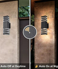Two Pack Dusk To Dawn Outdoor Wall Lights on stone wall, auto off in daylight and auto on at night mode, black aluminum lanterns