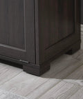 Corner view of wooden tilt out trash cabinet with espresso finish on tiled floor, part of the Tilt Out Trash Cabinet Wooden focus keyword