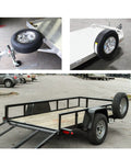 Stake Pocket Spare Tire Carrier For Trailers Heavy Duty Spare Tire Mount Bracket In Powder Coat Black Steel Fits Most 4 To 8 Lug Wheels On 4 To 6.5 Inch Bolt Patterns Upgraded Double Screw Fixation And 3 Nut Lock For Stable No Shake Quiet Ride mounted on trailer with spare tire.