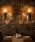 Gatheroad Pillar Candle Wall Sconces Set of 2, Gothic Lattice Crown Decor illuminating a rustic stone wall.