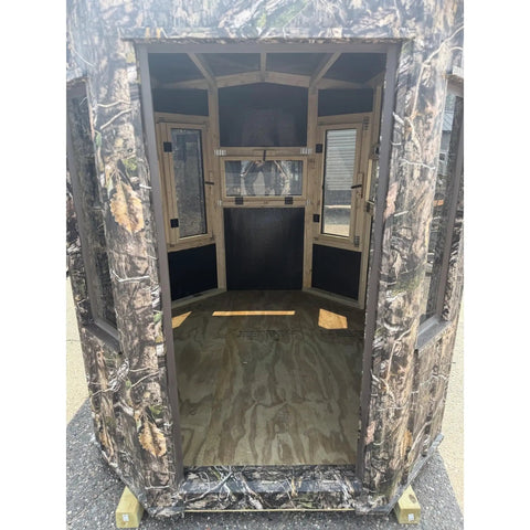 Interior view of Kick Ass Solid 6X8 Wooden Deer Blind Featuring Hella Warm R6 Insulation Panels Amish Crafted Hunting Shooting House.