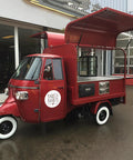10.5Ft Turnkey Mobile Food Truck And Concession Trailer Featuring Three Serving Windows With Built In Commercial Kitchen Gear And Hella Spacious Storage For Your Startup Hustle That Gonna Take Off, red three-wheeled food truck with open serving area.