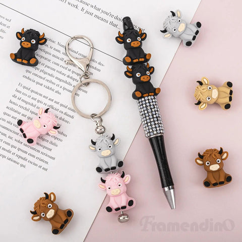20 Pack Highland Cow Silicone Beads Set For DIY Jewelry And Crafts with pen and keychain featuring cute cattle spacers in 5 color options