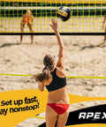 Volleyball player hitting over Volleyball Training Net For Pro Level Practice 12 Foot Wide Portable Net With Adjustable Height