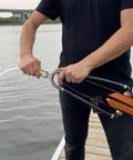 Heavy Duty Steel Boat Motor Flusher With Dual Flow Muff Style Five Eighths Inch Garden Hose Connection in use by water
