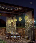 Hanging Solar Lanterns Outdoor Decor For Patio Pathway Yard And Garden, Waterproof Plastic Moroccan Style Lights illuminating a pergola.