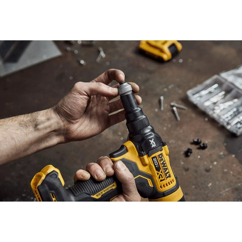 Using 20V Max XR Cordless Rivet Tool Three Sixteenths Inch With Brushless Motor, 2100 Lbf Pulling Force, adjusting nose piece