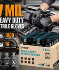 Heavy Duty 7 Mil Black Nitrile Disposable Gloves For Mechanics Built Different Rock Solid Puncture Resistance And Dang Good Grip Packaged In A Slick Dispenser Box, shown in a workshop amidst tools.
