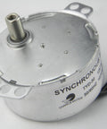 Close-up of 12V AC Synchronous Motor TYD-50 with 10-12 RPM, 11mm flush shaft, CW fixed rotation, compact design, side view.