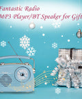 Grab N Go Portable AM FM Shortwave Radio Bluetooth Speaker with gift box on blue background with snowflakes.