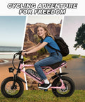 Teen riding 16-Inch Fat Tire Electric Mountain Bike With 800W Peak Motor, Removable Battery, Front Fork Suspension, Black Pink