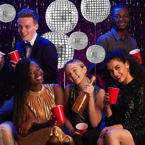 Group at party with Silver Disco Balloons Set Of 48 In Assorted Sizes 10 Inch 22 Inch 32 Inch Metallic Round Party Balloons