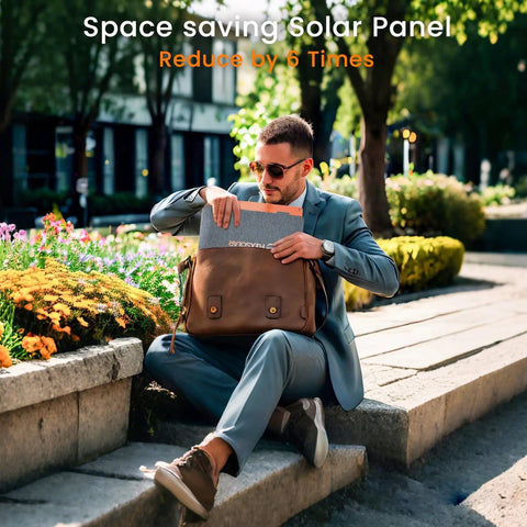 Man placing 100W Ultra Portable Solar Panel Charger With PD3.0 USB-C, QC3.0 USB-A And DC Outputs into a bag on a city street.