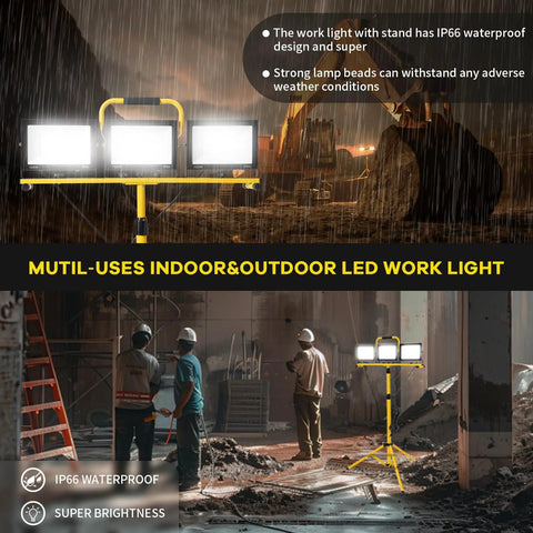 Heavy Duty Led Work Light With Beefy Telescoping Tripod, 30000 Lumens, Three Pivotable Heads, Waterproof Housing, And Badass 16 Ft Power Cable For Projects in use on a construction site.