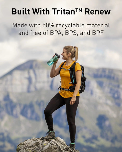 Person hiking uses Chute Mag Water Bottle With Magnetic Cap And Leak Resistant Design For Easy One Hand Sips On The Go Ultra Lightweight Tritan Build