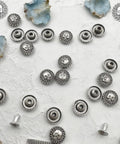 Top Shelf Badass Metal Skull Buttons And Screw Back Rivets For Leather Crafting 100 Pc Bulk Set showing detailed zinc alloy rivets.