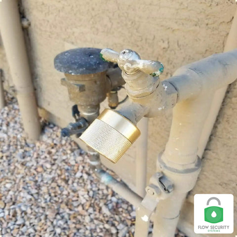 FaucetLock Heavy Duty Brass Faucet Lock For Outdoor Hose Bibbs secures 3/4 inch spigot, preventing water theft and tampering.