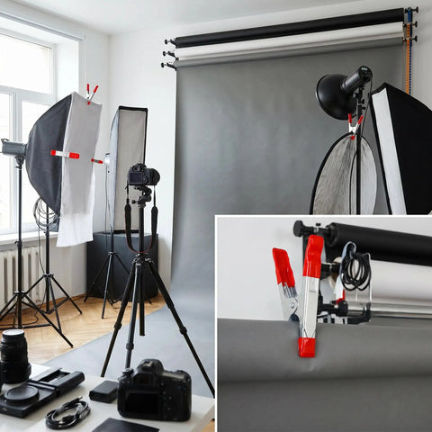 30 Pack 4 Inch Steel Spring Clamps With Ergonomic Handles And One And One Third Inch Jaw Opening used in a photo studio backdrop setup