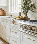 Modern kitchen with Champagne Bronze Cabinet Knobs 10 Pack Modern Gold Pulls on white cabinets and drawers