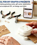 4 In 1 Multi Shape Paper Punch With Oval Fish Eye Dovetail And Beveled Corners Ultimate DIY Craft Cutter in use for scrapbooking.