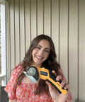 Woman holding Beast Cordless Scissors For Cardboard And Box Cutting Power Cutter With Rechargeable 4V Battery Safety Lock LED Work Light