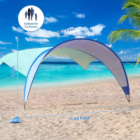 Windproof Beach Tent Sun Shelter With UPF50 Plus Protection, 11.5 By 10.5 Feet Beach Canopy with sandbags on sandy beach
