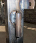 Side view of installed 8 Pack 2 Inch Weldable Barrel Hinges Heavy Duty Steel Weld On Bullet Door Hinges Detachable For Metal Swing Doors Gates And Glass Doors With 11 32 Inch Pin Bearing on metal gate.