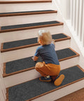 Non Slip Stair Treads For Wood Steps 8 By 30 Inches 15 Pack Self Adhesive Indoor Carpet Protectors with a child climbing stairs.