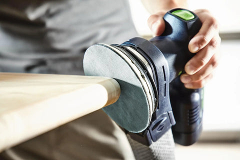 Granat Net P240 Grit PLANEX 8 7/8 Inch Diameter 225mm Abrasive Sanding Discs in use on wood surface with power tool