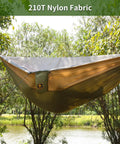 Super Comfy Double Hammock With Mosquito Net For Outdoors Portable Lightweight Nylon Parachute Hammock With 10ft Tree Straps hung between trees