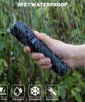 Hand holding Rechargeable Flashlights 99000 Lumens Super Bright LED With 15 Hour Runtime 5 Modes IPX7 Waterproof in rain