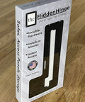 Hella Easy Invisible Picture Frame Hinges For Wall Safes And In Wall Stash Spots showing packaging with hardware, patent pending, plywood background.