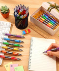 Desk with 100 Pack Crayon Themed Ballpoint Pens Bulk Pack Cute Back To School Gifts For Teachers And Coworkers in 6 Styles
