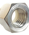 Close-up of Top Shelf No Twelve Twenty Four Nylon Insert Hex Lock Nut Cast From Corrosion Resistant Eighteen Eight Stainless Steel.
