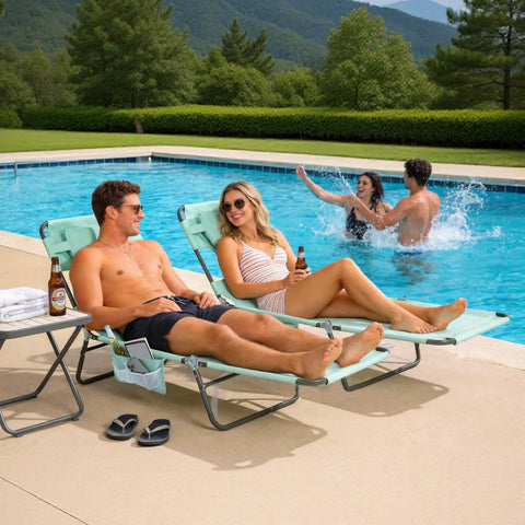 Couple sunbathing by pool on Reclining Beach Lounge Chair With Flat Lay Sunbathing Position, Folding Camping Cot With Backpack Straps