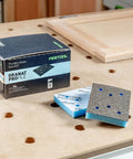 Granat Profile Sanding Sheets 3x4 Inch 80x133 Millimeter Set, 10 Pack, foam-backed sheets on workbench