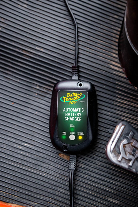 800 Milliampere SuperSmart Battery Charger and Maintainer on rubber mat