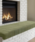 Custom Fit Fireplace Hearth Pad Big Time Ultra Snug Corduroy Baby Proof Buffer Bumper Non Slip on a fireplace ledge.