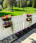 Level Up Your Porch Decor With This Ace Two Tier Railing Planter Box Set Black Window Boxes For Balcony Deck Garden Adjustable No Drill Clamp Rock Solid Iron Frame Easy Install Vibe with vibrant flowers on a white fence.