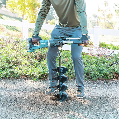 Man using Cordless 36V Brushless Earth Auger X2 Power No Gas No Mess Tool Only Drills 8 Inch Holes Up To 41 Inch Deep For Fence Posts And Decks