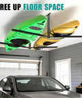 Overhead Ceiling Kayak Storage Rack For Garage Holds Two Kayaks Up To 200 Lbs Heavy Duty Universal Fit For Kayaks SUPs Surfboards Canoes And Snowboards With Foam Padding And Rust Resistant Coating installed above a car in a garage.