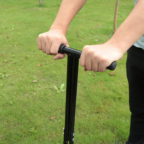 Man using Pro Grade Spike Aeration Tool for Compacted Soils and Lawns with Heavy Duty Steel Frame, 35 Inch by 11 Inch Black