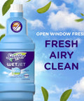 WetJet Hardwood And Floor Spray Mop Cleaner Starter Kit cleaning solution bottle with fresh airy clean on label
