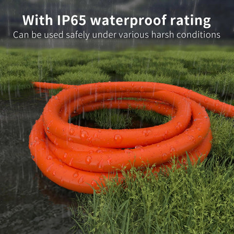 Heavy Duty Outdoor Extension Cord 50 Ft 12/3 Gauge SJTW Waterproof With Lighted End in rainy grass landscape
