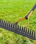 Close-up of 70 Inch Heavy Duty Metal Dethatcher Rake with 15 Inch Wide Double Edged Sharp Tines on grass