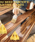 40 Piece Painter Pyramid Stands Set in use, lifting wooden panels for painting, yellow durable plastic, DIY woodworking support tool.