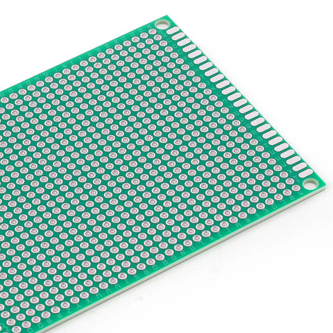 Close-up of one board from 32 Pieces PCB Board Set With Five Sizes Double Sided Prototyping Boards For DIY Electronics Projects Point One Inch Spacing With Corner Mount Holes Soldering Ready