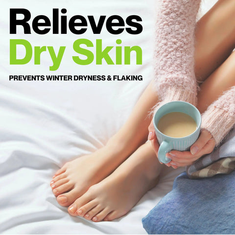 Person holding mug in cozy setting, text about relieving dry skin, image related to Six Pack Premium Humidifier Filters For Honeywell HAC 504 Series And HCM 350 Cool Mist Humidifiers Replacement For HAC 504AW And HAC 504V1 Durable High Quality Filters That Maximize Moisture Output.