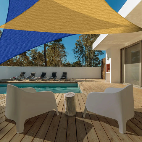 Poolside area with Triangle Sun Shade Sail 16 Foot By 16 Foot By 22.64 Foot UV Block Canopy providing shade over deck chairs
